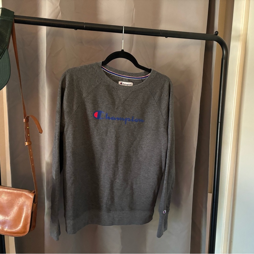 Women’s Champion sweatshirt. Normal wear, no holes.